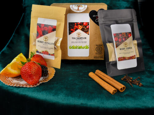 This picture shows sampler sizes of both the Ruby Ember and the Berry Vitality custom tea blends